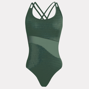 Traje de baño entero verde con control de abdomen y tirantes cruzados, vista frontal en fondo blanco.